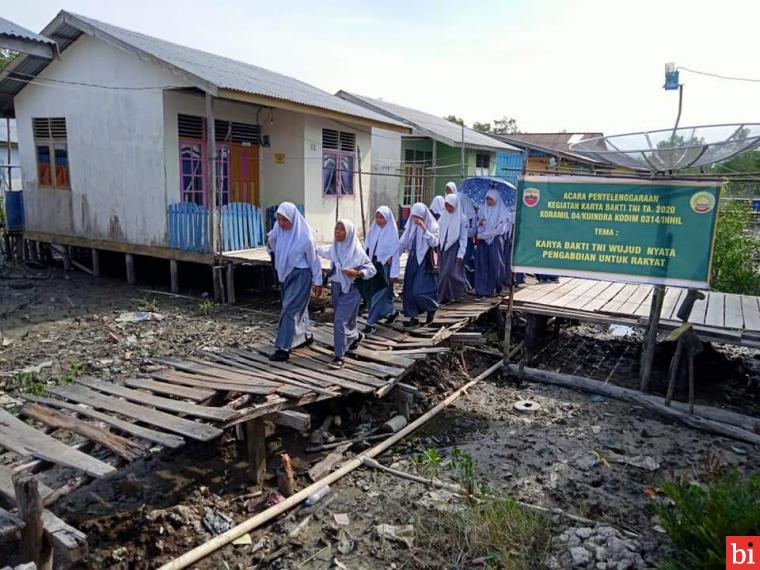 Koramil/04 Kuindra Kodim 0314/lnhil Karya Bakti TNI di Tembilahan