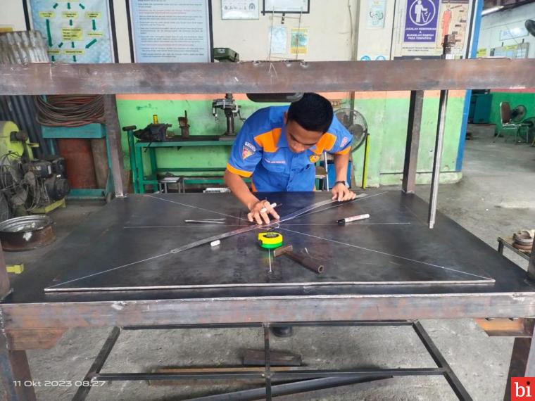 SMK Semen Padang Produksi Mesin Press Restorasi untuk Arsip